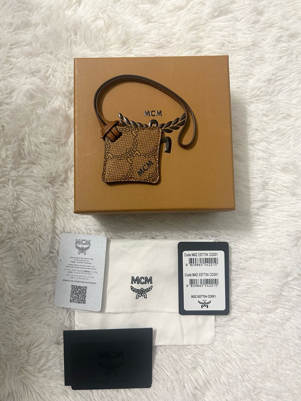 MCM Brown Air Tag Holder and Bag Charm with Signature Logo